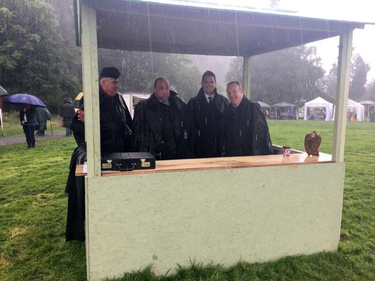Shelter from the storm. Mark MacKenzie, William Geddes, Gordon Bruce and Gordon McCreadie seek shelter in the judges' booth this afternoon at Killin.