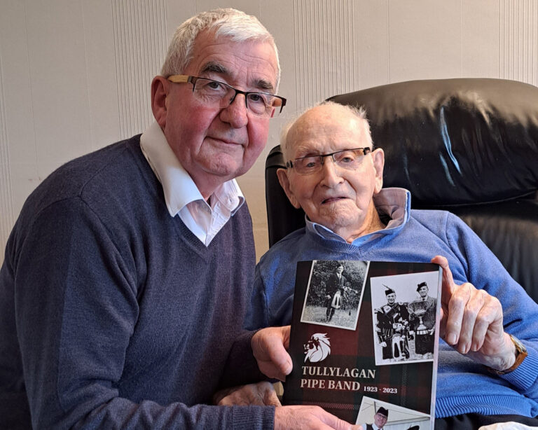 Read about 100 years of Tullylagan Pipe Band